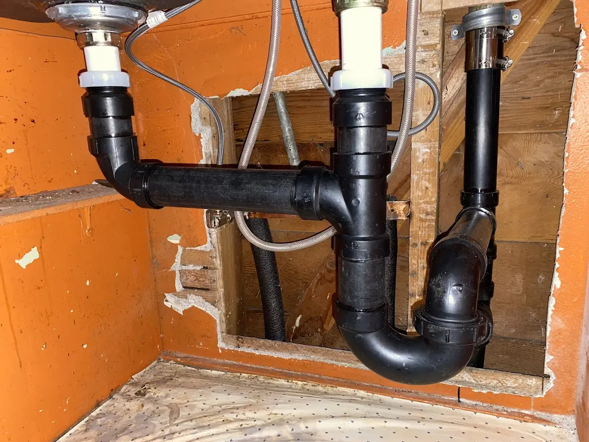 Professional Garbage Disposal Repair equipment and tools on the job in Sandstone